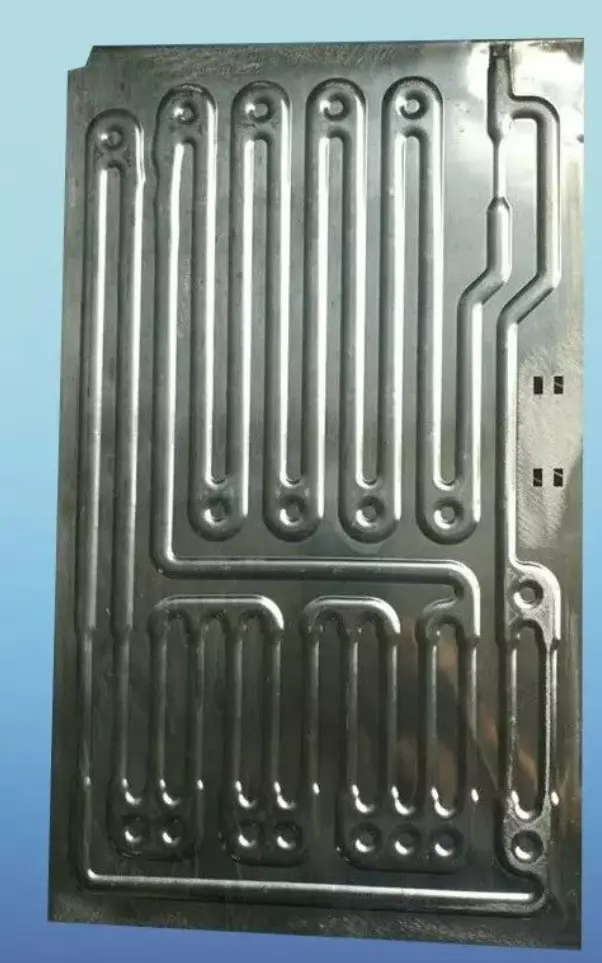 The stamped liquid cooling plate has the advantages of arbitrarily designed flow channels